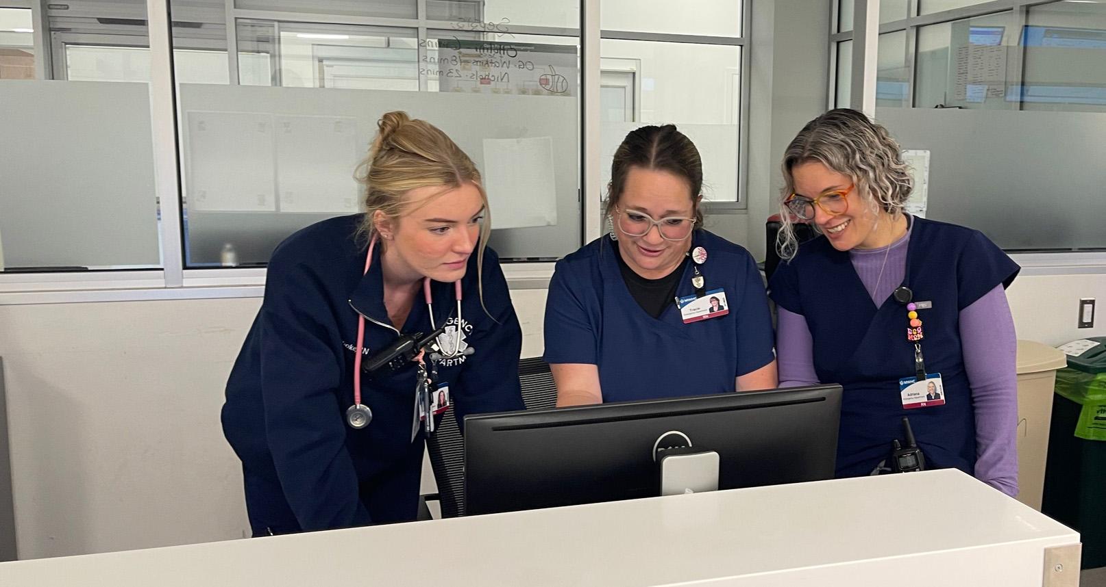 Nurse on the phone at a computer